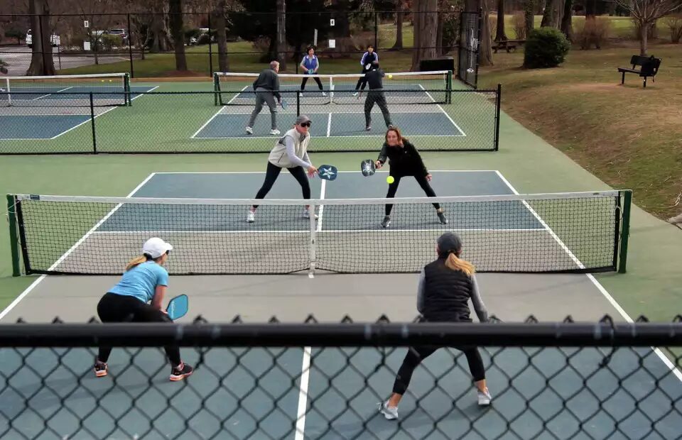 People are enjoying pickleball and enhancing their ratging capabilities on multiple pickleball playing courts 